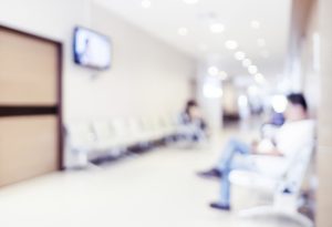 Blurred patient waiting for see doctor,abstract background.