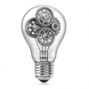 Lamp bulb and gears. Perpetuum mobile idea concept.